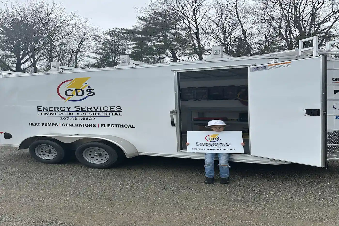 Generac standby generator installed beside a Maine home by CDS Energy Services — licensed electrician serving all of Maine